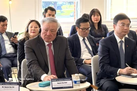 Permanent Deputy Prime Minister Nguyen Hoa Binh addresses the Vietnam–US Finance and Technology Dialogue. (Photo: VNA)