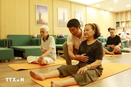 Elderly people take part in activities at a daytime care centre for senior citizens. (Photo: VNA)