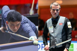 Vietnamese billiards players Bao Phuong Vinh (L) and Tran Quyet Chien compete at the 2025 World Championship 3-Cushion National Teams in Viersen, Germany. (Photo: Union Mondiale de Billard)