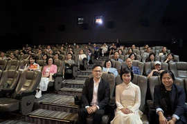 The audience at the screening of the Vietnamese film “Dao, Pho and Piano” (Peach Blossom, Pho and Piano) at the 3rd ASEAN Film Festival in Hong Kong (China). (Photo: VNA)