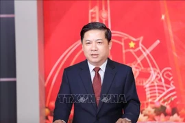 Luong Nguyen Minh Triet, alternate member of the Party Central Committee, Secretary of the Dak Lak provincial Party Committee, talks to the press (Photo: VNA)