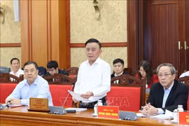 Politburo member and permanent member of the Party Central Committee’s Secretariat Tran Cam Tu speaks at the event in Hanoi on December 19 (Photo: VNA)