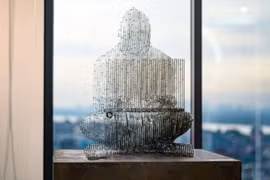 Satoshi Nakamoto's statue Blockchain Gallery in Hanoi (Photo: VNA)