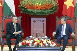Party General Secretary To Lam (right) receives Speaker of the Jordanian House of Representatives Mazen Turki El Qadi in Hanoi on February 3. (Photo: VNA)