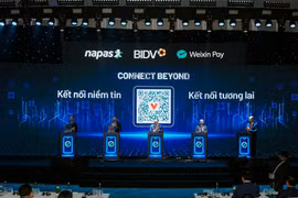 A view of the launch ceremony for the expanded Vietnam–China cross-border QR payment service. (Photo: NAPAS)