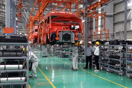 Production activities at the passenger car manufacturing and assembly plant of Kim Long Motor Hue Joint Stock Company in Chan May – Lang Co Economic Zone in Hue city. (Photo: VNA)