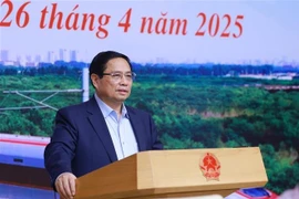 PM Pham Minh Chinh speaks at the meeting. (Photo: VNA)