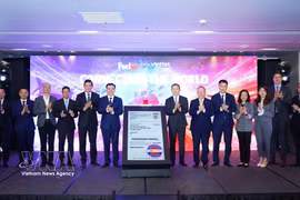 Viettel Post and FedEx announced their partnership (Photo: VNA)
