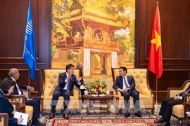 Minister of Science and Technology Nguyen Manh Hung (R) and WIPO Director General Daren Tang at the meeting in Hanoi on September 25 (Photo: VNA)