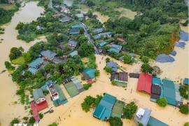 Widespread flooding in Ha Giang 1 and Ha Giang 2 wards of Tuyen Quang provice. (Photo released by VNA)