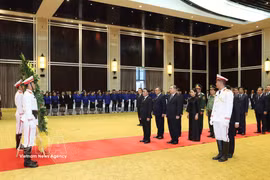 Politburo member, Standing member of the Communist Party of Vietnam Central Committee's Secretariat Tran Cam Tu leads a high-level delegation of the CPV to attend the funeral service for Politburo member of the Lao People's Revolutionary Party (LPRP) Central Committee and President of the Lao National Assembly Xaysomphone Phomvihane on August 12, 2026. (Photo: VNA)