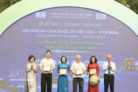 The organisers of VITM 2026 honour sponsors. ( Photo: VNA)