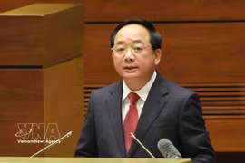 Politburo member, Secretary of the Party Central Committee and Chairman of its Commission for Information, Education and Mass Mobilisation Trinh Van Quyet speaks at the national conference. (Photo: VNA)