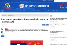 The article praising the great friendship between Vietnam and Laos is published on the Pathet Lao online newspaper of the Lao News Agency. (Photo: VNA)