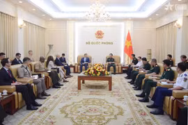 Deputy Prime Minister and Minister of National Defence General Phan Van Giang hosts a reception in Hanoi on June 22 for Acting US Secretary of the Navy Hung Cao. (Photo; qdnd.vn)