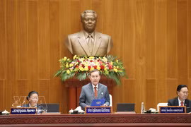 Politburo member and President of Laos’ ninth National Assembly Xaysomphon Phomvihane delivers the opening address at the session. (Photo: VNA)