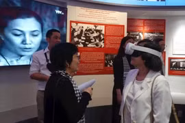 Visitors experience a digital interactive exhibition space at the War Remnants Museum in Ho Chi Minh City. (Photo: nhandan.vn) 