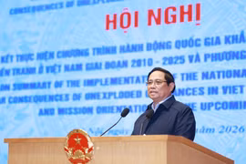 Prime Minister Pham Minh Chinh speaks at the conference in Hanoi on January 13. (Photo: VNA)