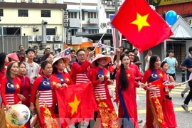 "Vietnam–Malaysia Friendship Ao Dai” collection by the Vietnam Ao Dai Heritage Club in Kuala Lumpur leaves a deep impression on viewers (Photo: VNA)