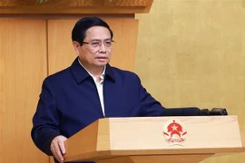 Prime Minister Pham Minh Chinh addresses the session on January 7. (Photo: VNA)