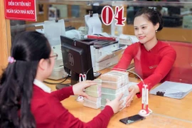 At an Agribank office. The banking sector is at the forefront of unblocking green capital flows. (Photo: VNA)
