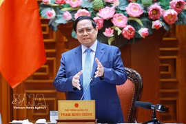 Prime Minister Pham Minh Chinh addresses the event. (Photo: VNA)