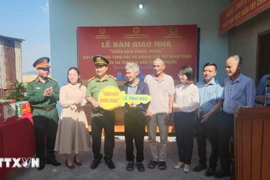 At a handover of newly built houses to flood-affected residents in Gia Lai province. (Photo: VNA) 