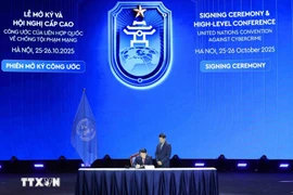 Minister of Public Security Luong Tam Quang signs the UN Convention against Cybercrime (Hanoi Convention). (Photo: VNA)