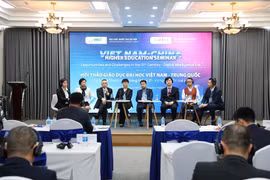 The seminar is held on March 1 (Photo: VietnamPlus)