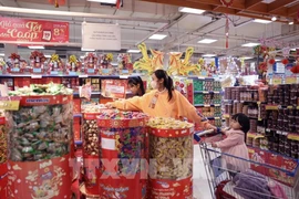 Affordable goods with fine packaging for upcoming Lunar New Year (Photo: VNA)