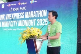 Deputy Director of the municipal Department of Culture and Sports Nguyen Nam Nhan speaks at the event. (Photo: VNA)