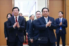 PM Pham Minh Chinh (R) and Prof. Dr. Qiu Yong, Secretary of the Tsinghua University’s Party Committee and Academician of the Chinese Academy of Sciences. (Photo: VNA)