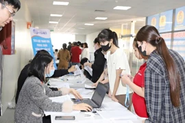Workers in Bac Ninh province receive health check-ups. (Photo: daibieunhandan.vn)