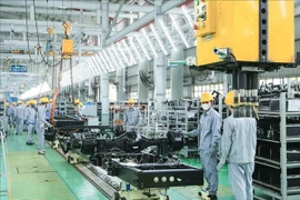 At THACO auto assembling factory (Photo: VNA)