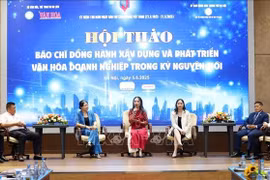 At the seminar on the press’s role in the building of corporate culture in the new era, held in Hanoi on June 5. (Photo: VNA)