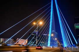 The dynamic, modern vibrancy of Ho Chi Minh City at night. (Photo: nhandan.vn)