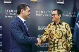 Indonesian Trade Minister Budi Santoso (right) and Uzbek Foreign Minister Bakhtiyor Saidov (Photo: worldnewsam.com)