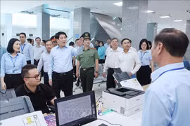 State President Luong Cuong visits the Quang Ninh one-level public administrative service centre on July 29. (Photo: VNA)