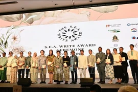 Writers are honoured at the Southeast Asian Writers Award ceremony for 2024-2025. (Photo: VNA)