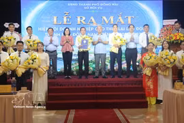 The Ministry of Home Affairs officially launches Vietnam's national job exchange and witnesses the debut of the Dong Nai Labour Leasing Business Association on July 31. (Photo: VNA)