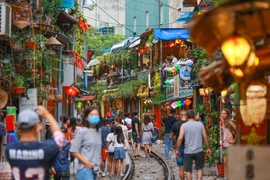 The railway café street has become one of Hanoi’s most photographed attractions in recent years. (Photo: VNA)