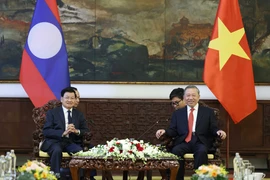 General Secretary of the Communist Party of Vietnam (CPV) Central Committee To Lam (R) receives General Secretary of the Lao People’s Revolutionary Party (LPRP) and President of Laos Thongloun Sisoulith in Ho Chi Minh City on April 29 (Photo: VNA)