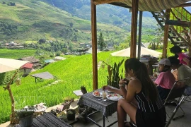 Coffee shops overlooking lush green terraced fields and set close to nature in Ta Van, Lao Cai province, are popular with visitors. (Photo: VNA)