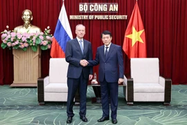 Minister of Public Security Gen. Luong Tam Quang (right) and Nikolai Patrushev, Aide to the President of Russia and Chairman of the Maritime Board at the meeting in Hanoi. (Photo: VNA)