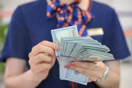 Exchange rate pressure remains a burden for managers in 2025. (Photo: VietnamPlus)