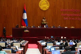 At the 9th Lao National Assembly's 9th session (Photo: qdnd.vn)
