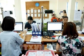 The VSS reported that total accumulated reserves across the social, health, and unemployment insurance funds now top 1.5 quadrillion VND. (Illustrative photo: VNA)