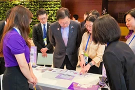 LynkiD representatives introduced technology solutions to Japanese delegates attending the P4G Summit. (Photo: courtesy of the firm)