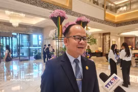 Khammone Chanthachith, Deputy Head of the Commission for Propaganda and Training of the Lao People's Revolutionary Party Central Committee, in the interview with the Vietnam News Agency. (Photo: VNA)