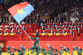 An art performance held at the grand ceremony and parade (Photo: VNA)